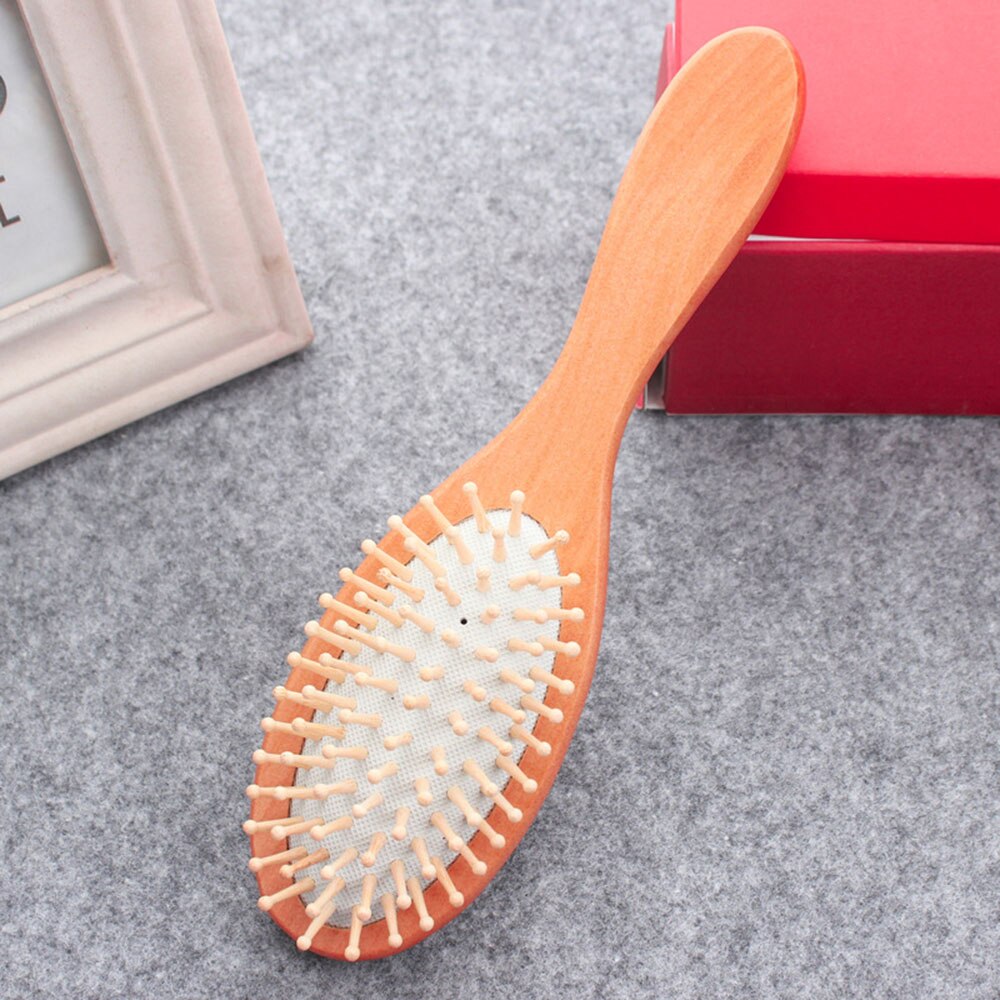 Brosse à cheveux en bois, forme ovale, picot blanc, fond blanc, - PBS - Naturopathie & Zéro déchet